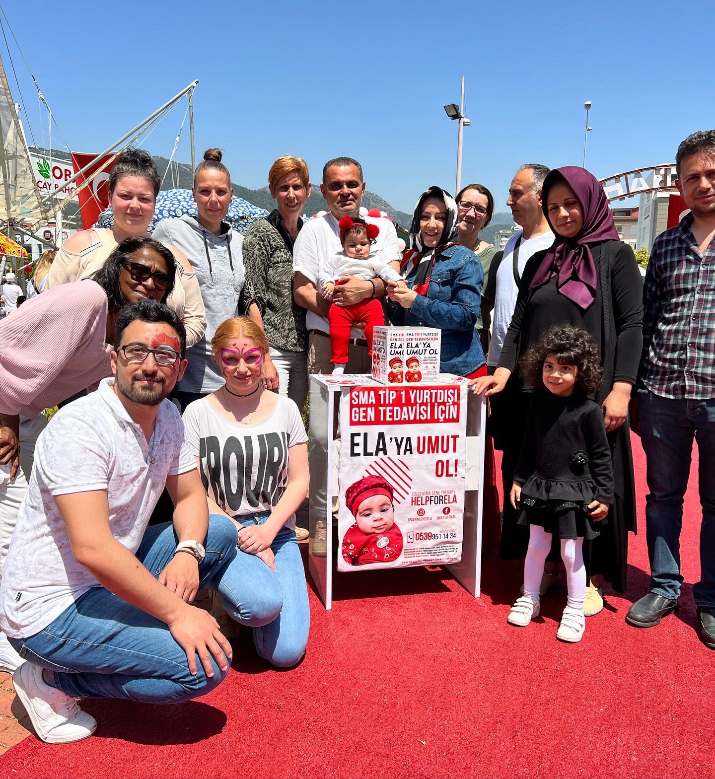 Yerleşik yabancılar Ela bebek için kermes düzenledi